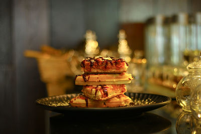 Close-up of bread in glass on table