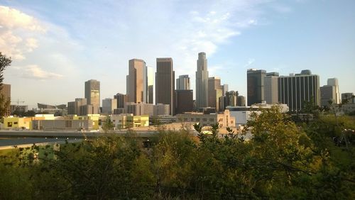 Skyscrapers in city against sky