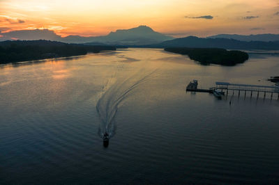 Scenic view of lake during sunset