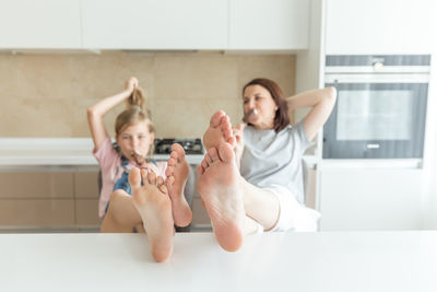 Mother and daughter at home