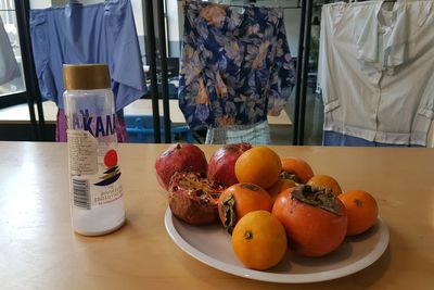 Close-up of fruits in plate on table