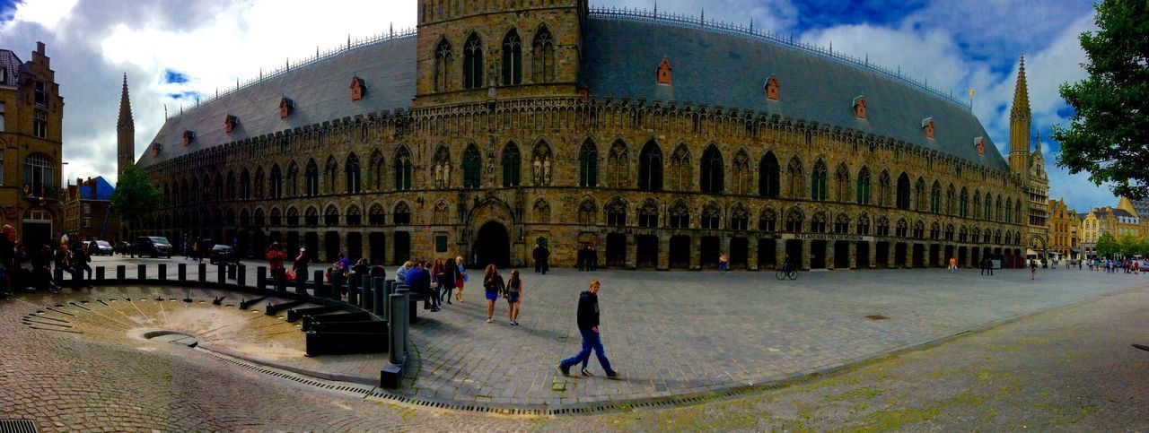 PEOPLE WALKING IN TOWN SQUARE