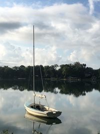 Boats in calm lake