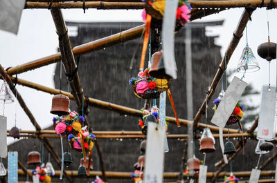 Wind-bells in the rain