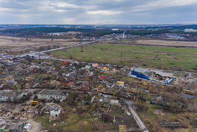 The aerial view of the destroyed and burnt buildings.