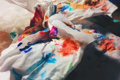High angle view of messy bed