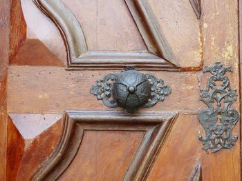 Close-up of sculpture on door