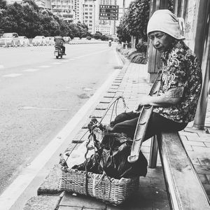 Woman sitting on bench