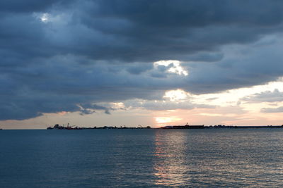 Scenic view of sea against sky at sunset