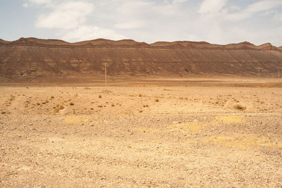 Scenic view of desert against sky