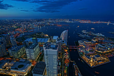 High angle view of illuminated city buildings