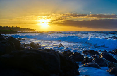 Scenic view of sea against sky during sunset