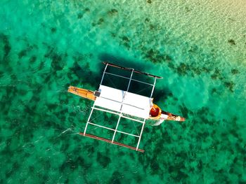 Out rigger boat in sea