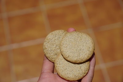 Close-up of hand holding bread