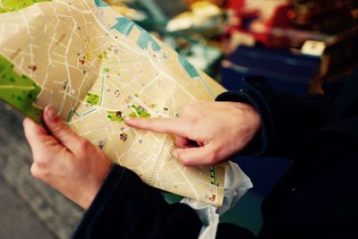 Close-up of woman holding map