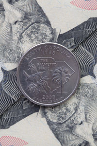 Close-up of coins on table