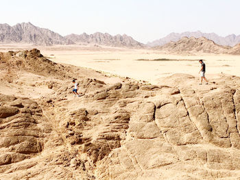 Scenic view of desert against sky