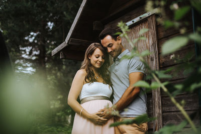 Young couple standing outdoors