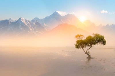 Scenic view of snowcapped mountains against sky