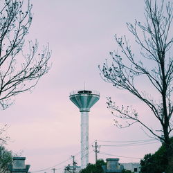 Low angle view of water tower against sky