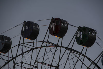 Low angle view of lighting equipment against sky