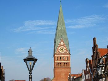 Low angle view of st john church in luneburg against sky