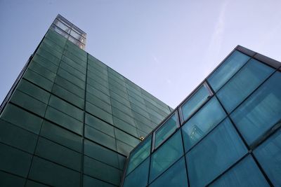 Low angle view of modern building against sky