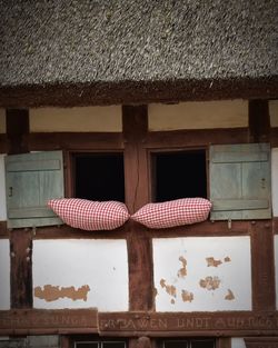 High angle view of old house against building