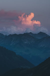 Scenic view of mountains against sky during sunset