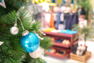 Close-up of christmas decoration hanging on tree