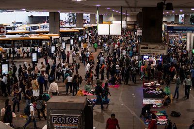 High angle view of people walking on street in city