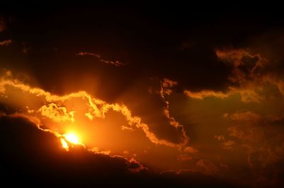 Low angle view of dramatic sky during sunset