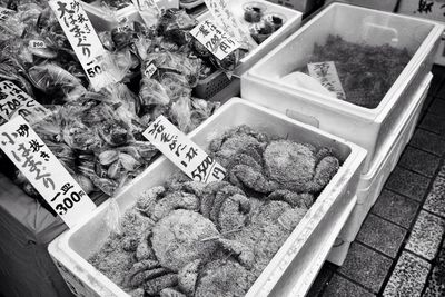Variety of vegetables for sale at market stall