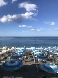 Scenic view of sea against blue sky