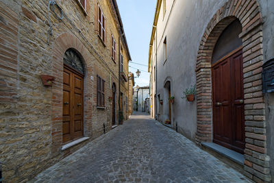 Narrow alley along buildings