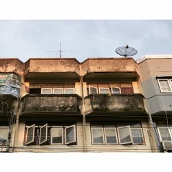 Low angle view of old building against sky