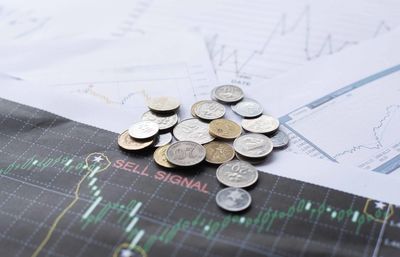 High angle view of coins on table