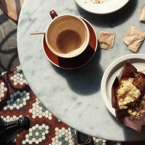 Close up of coffee cup on table