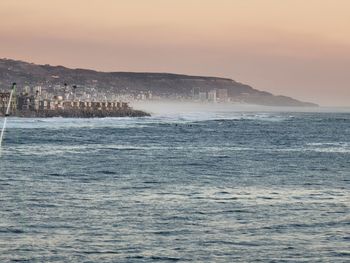 Scenic view of sea against sky during sunset