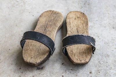 A pair of clogs for turkish bath.shoes with a thick wooden sole.