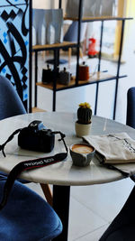 Close-up of camera on table