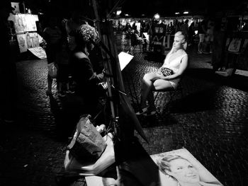 People sitting in market