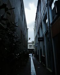 Narrow alley along buildings