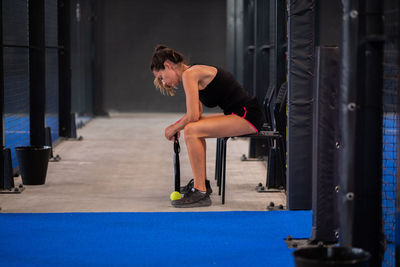 Portrait of woman lost the padel or tennis match - portrait of paddle tennis player crying for loss 