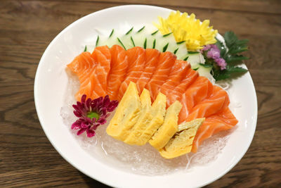 Close-up of fish served on table