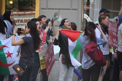 Group of people standing on street