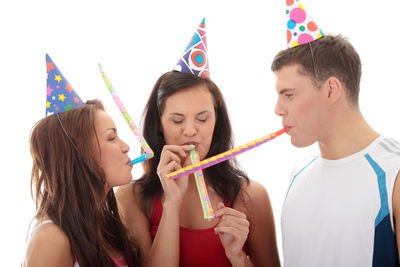 Portrait of happy woman holding camera