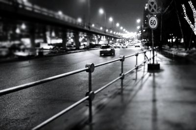 Cars on street in city at night