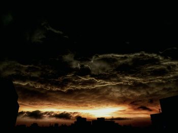 View of built structures at sunset
