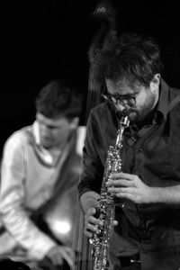 Young man playing music concert